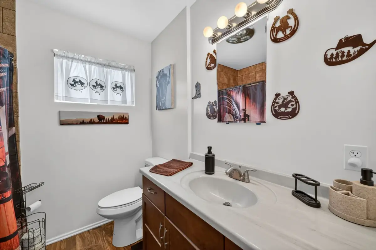 Front of the single-story home with garage and mountain views — 514 E Victory St, Banning, CA 92220